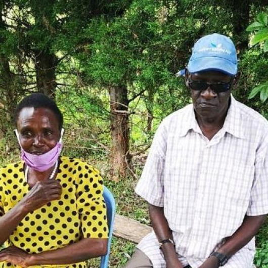 Amos Biwott and wife